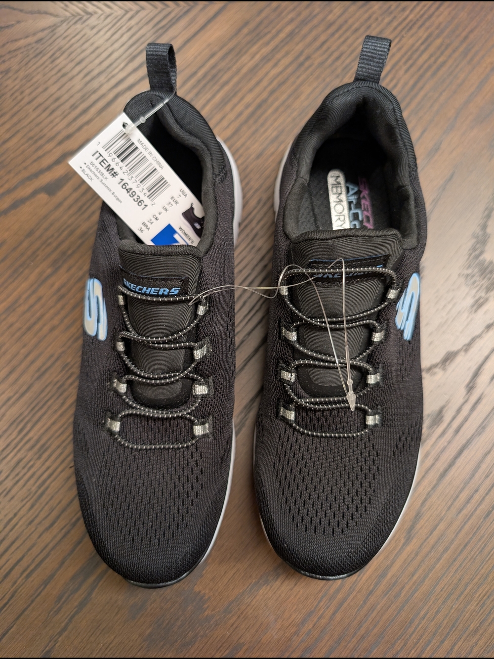 Skechers Women's Black Slip-On Knit Sneakers with Light Blue Logo Sz 7